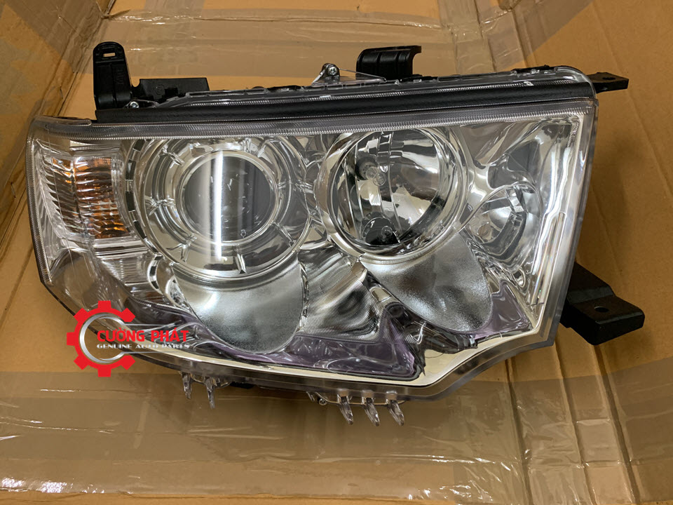 Hình ảnh đèn pha Mitsubishi Pajero Sport 2013-2018 chính hãng